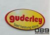 Fa. Guderley Showroom - Beschriftung, oval formgeschnitten mit Digitaldruck schutzlaminiert beschriftet, zur Wandmontage auf Alurahmen, von 089Werbung Mnchen.